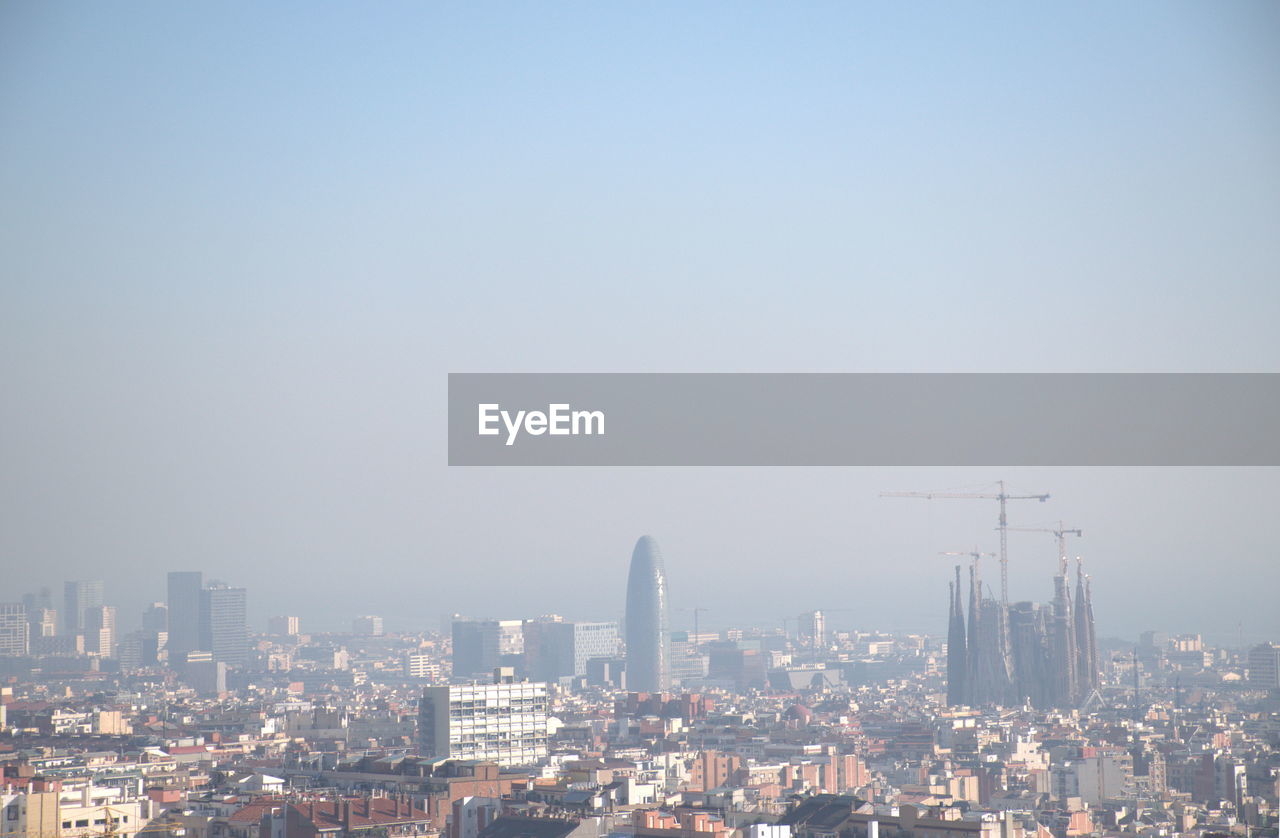 Cityscape against clear sky