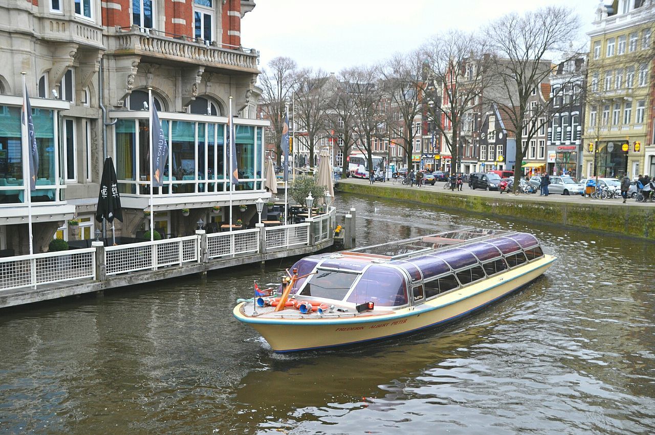 VIEW OF BOATS IN CANAL