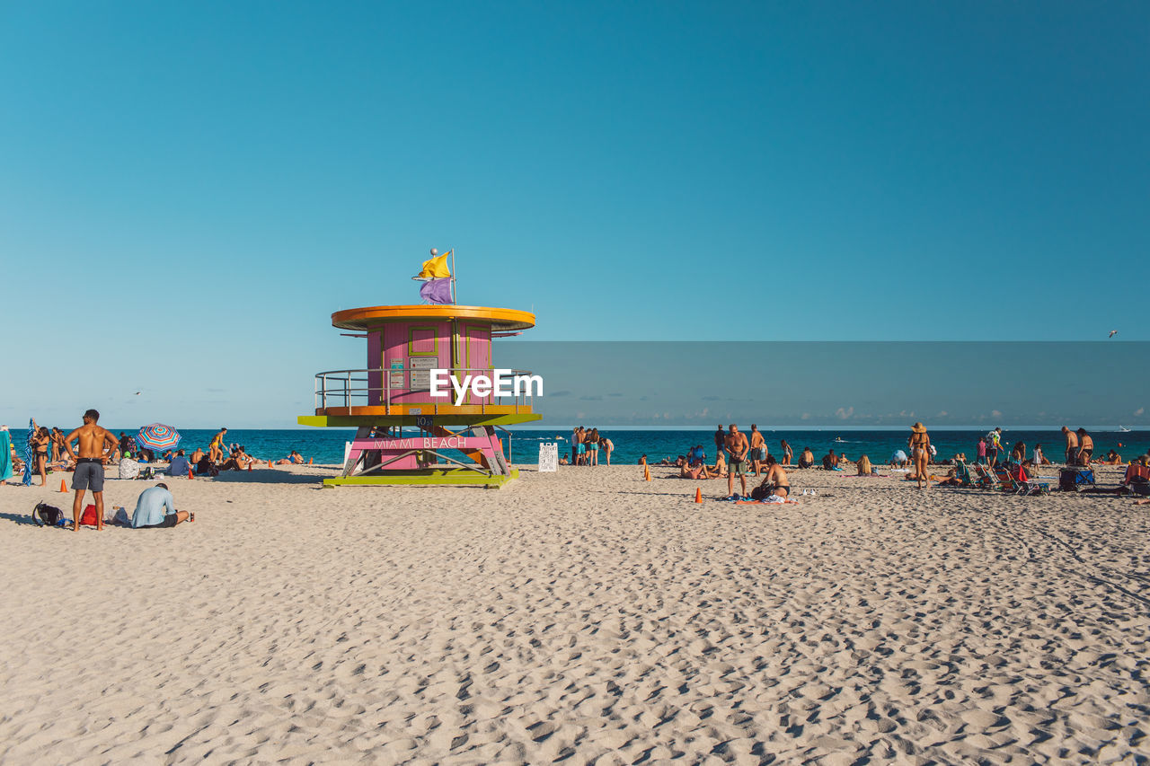 scenic view of beach against clear sky