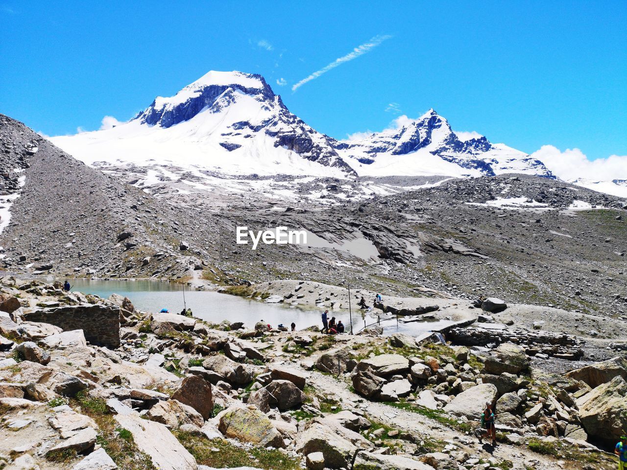 SNOW COVERED MOUNTAIN AGAINST SKY