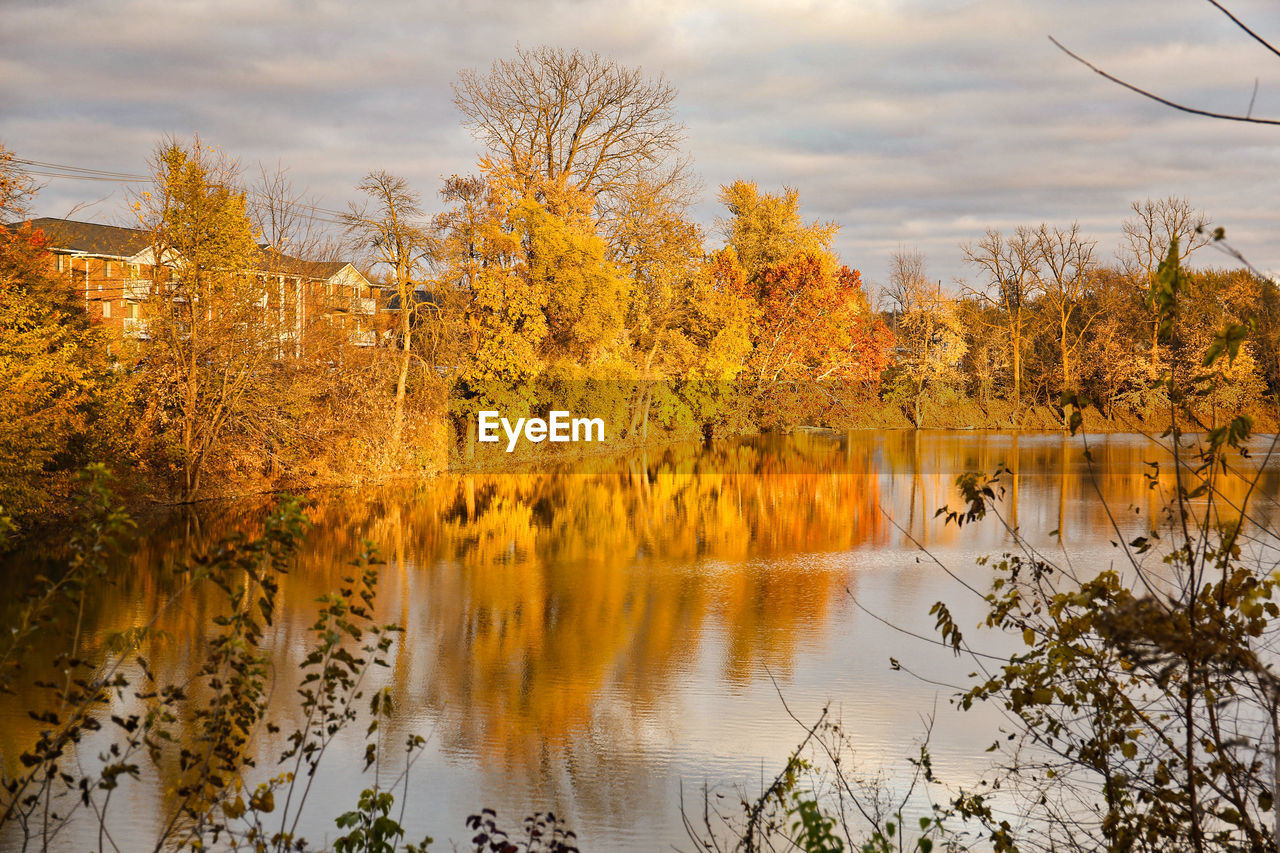 Scenic view of lake against sky during autumn