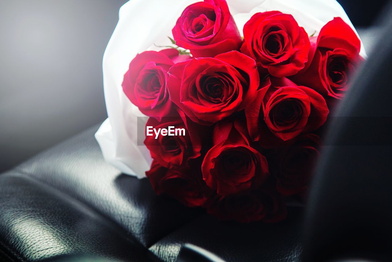 CLOSE-UP OF RED ROSE BOUQUET