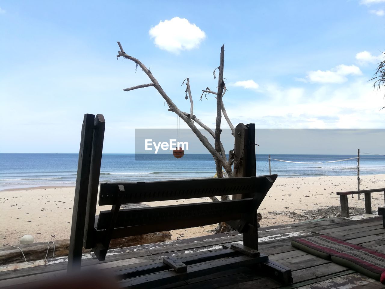 LIFEGUARD HUT ON BEACH AGAINST SKY