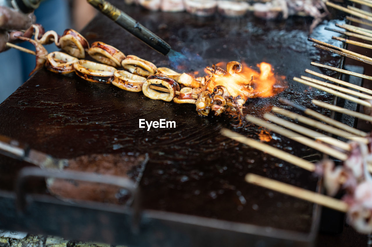 high angle view of meat on barbecue grill