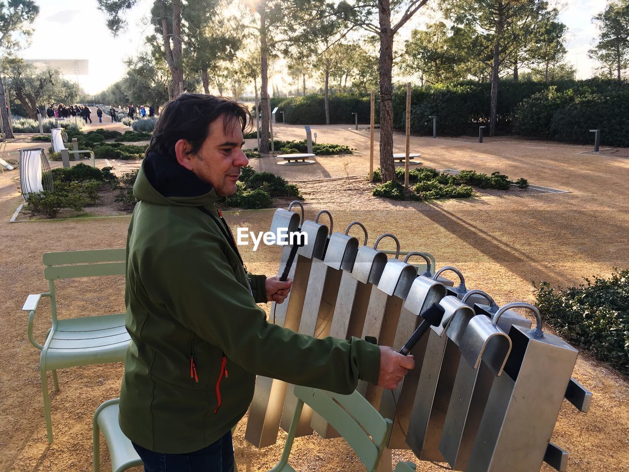 Side view of mature man exercising in park