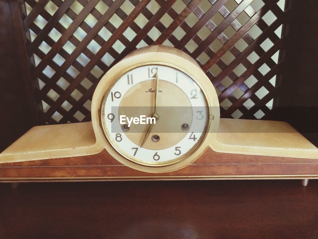 DIRECTLY ABOVE SHOT OF CLOCK ON TABLE IN BATHROOM