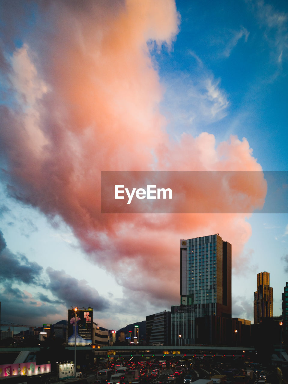 BUILDINGS AGAINST SKY DURING SUNSET