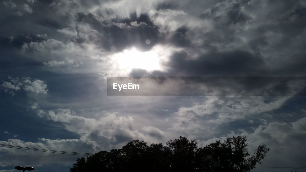 Sun in cloudy sky