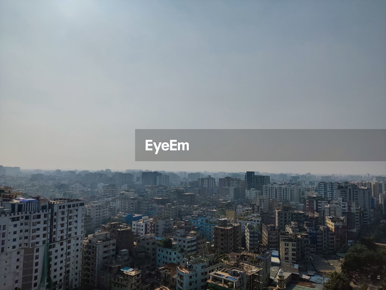 High angle view of buildings against clear sky