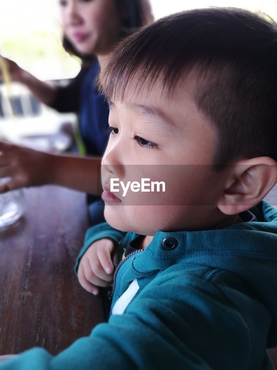 CLOSE-UP OF CUTE BOY WITH EYES CLOSED