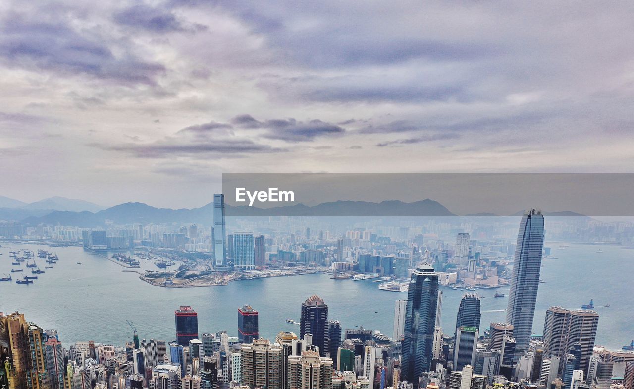 High angle view of buildings in city at victoria harbor