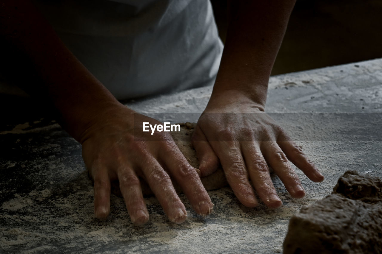 Close-up of man working on wood