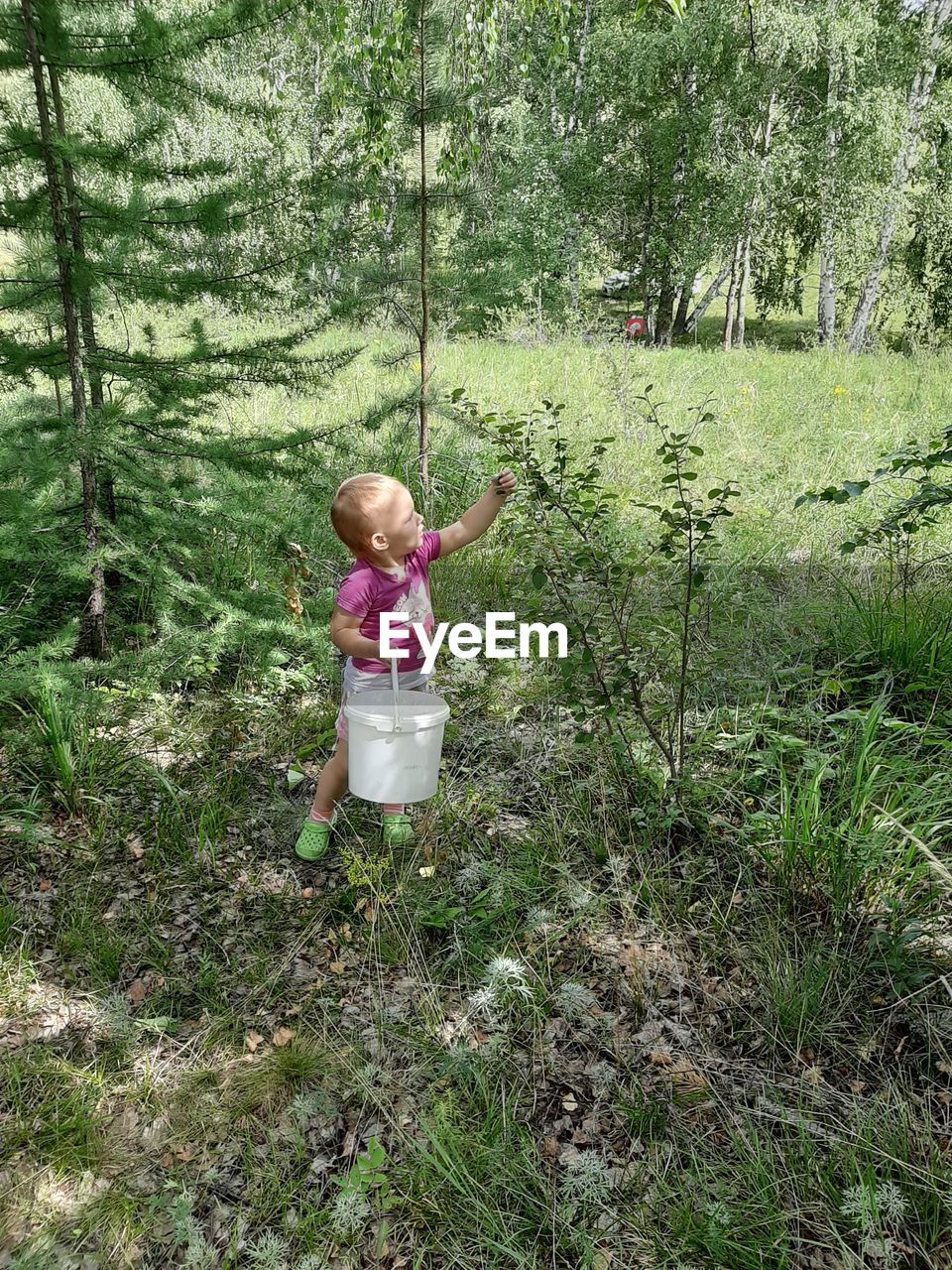 Girl standing on field