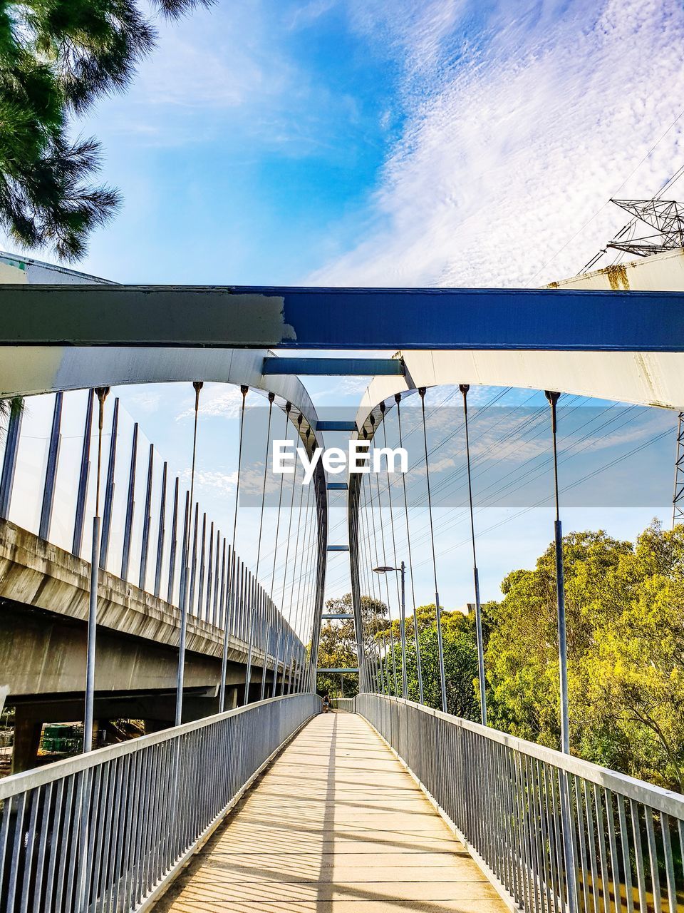 BRIDGE OVER FOOTBRIDGE AGAINST SKY