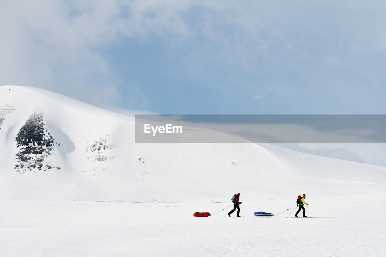 People skiing, sarek national park, lapland, sweden