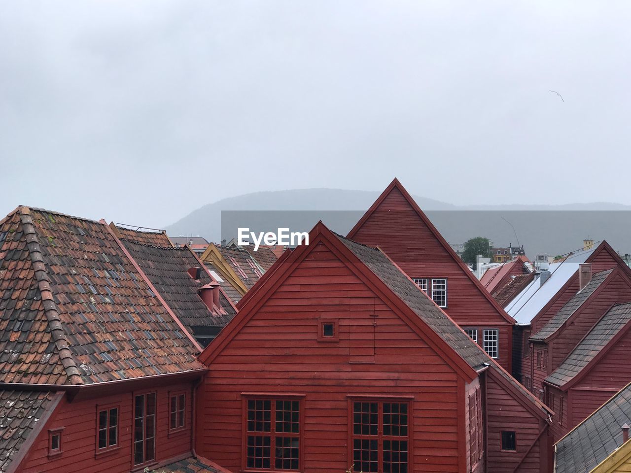 Buildings in city against sky