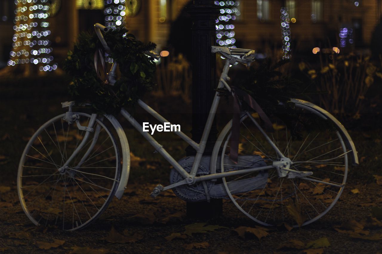 BICYCLES PARKED ON STREET IN CITY