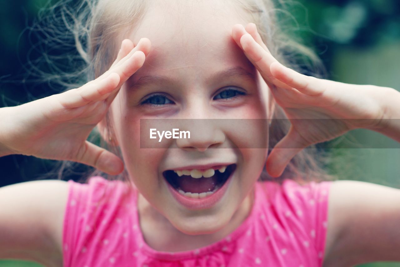 Portrait of cute smiling girl