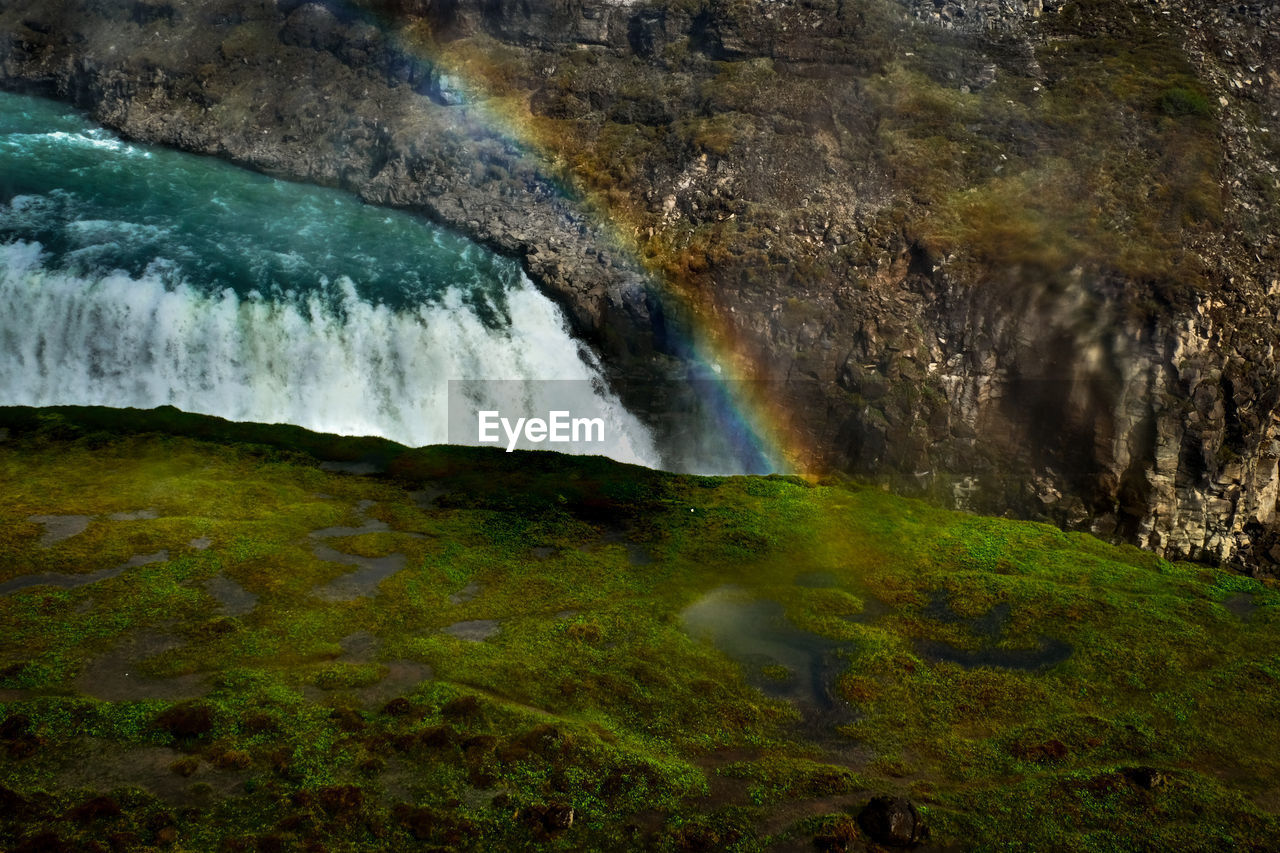 WATER FLOWING THROUGH GRASS