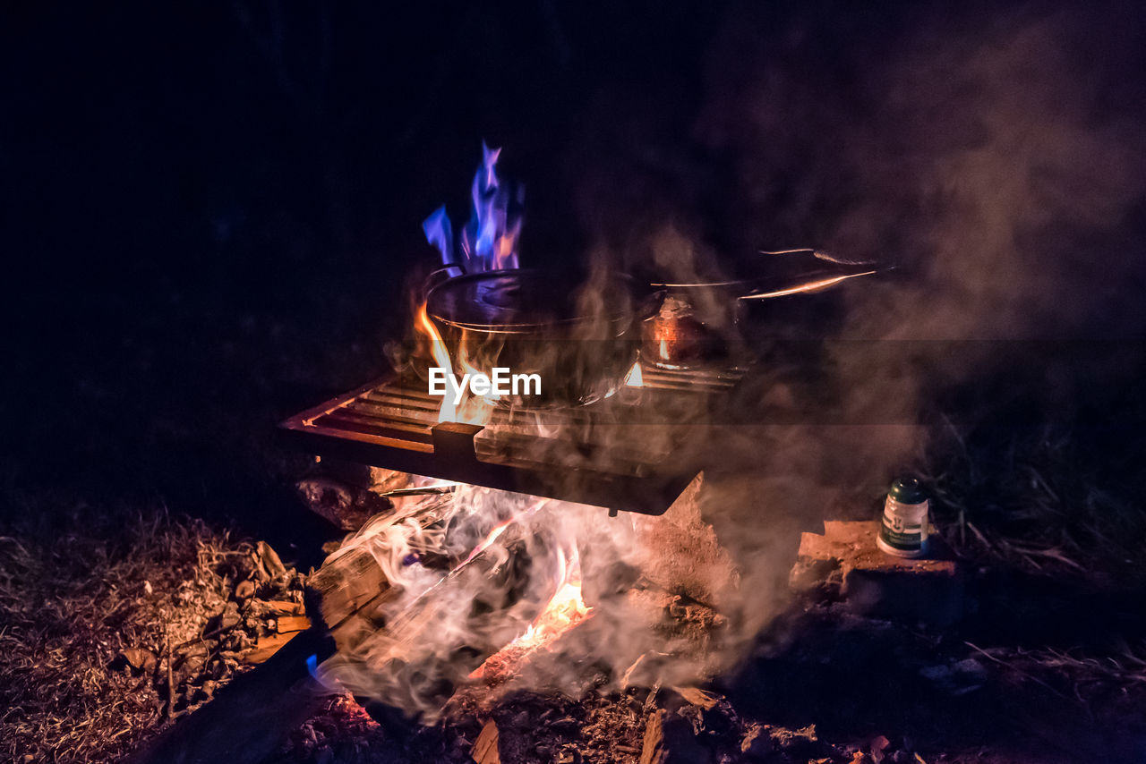 campfire, fire, burning, heat, flame, bonfire, nature, darkness, night, smoke, fireplace, camping, wood, glowing, motion, food and drink, no people, food, log, outdoors