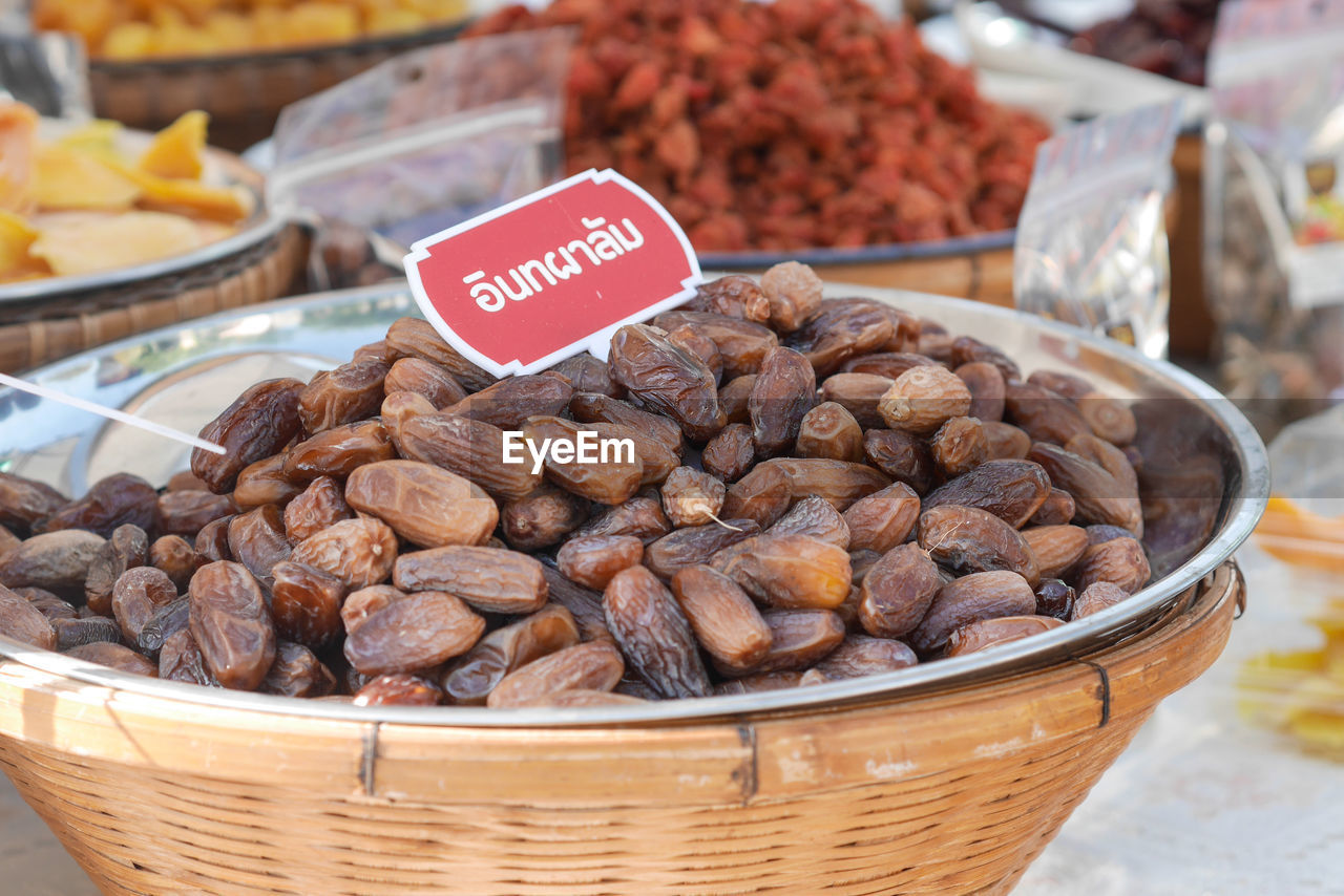 FRUITS IN BASKET FOR SALE AT MARKET