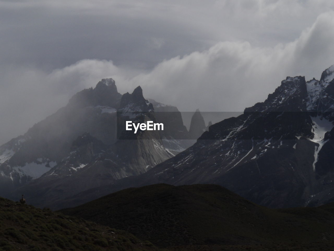 Scenic view of mountains against cloudy sky, torres del paine mountain