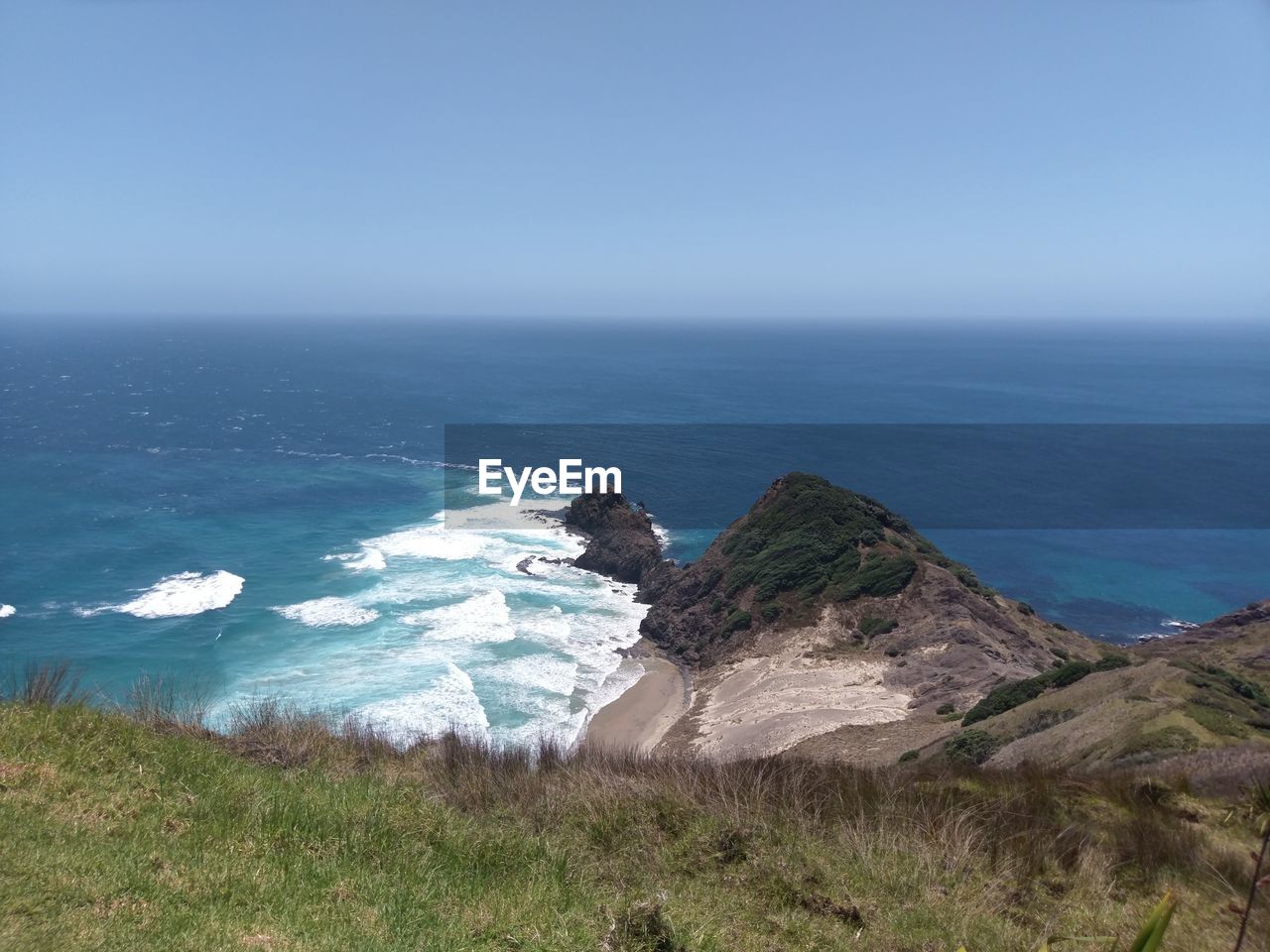 Scenic view of sea against clear sky