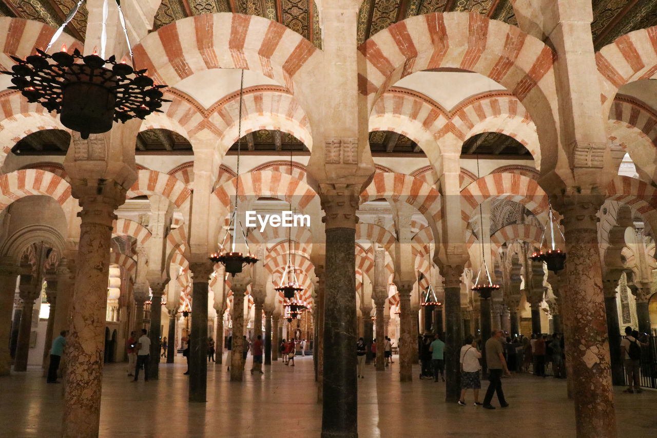 GROUP OF PEOPLE IN A BUILDING