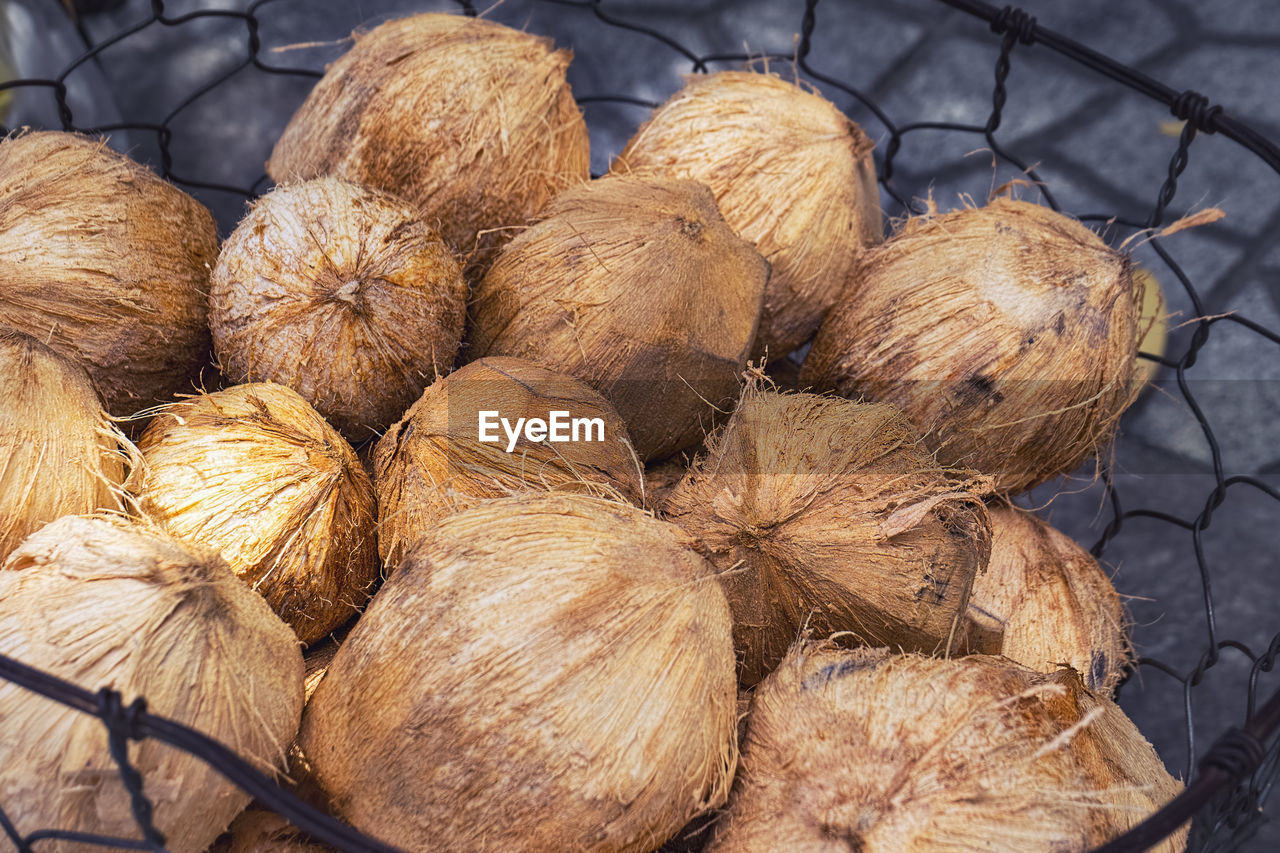 CLOSE-UP OF ONIONS FOR SALE