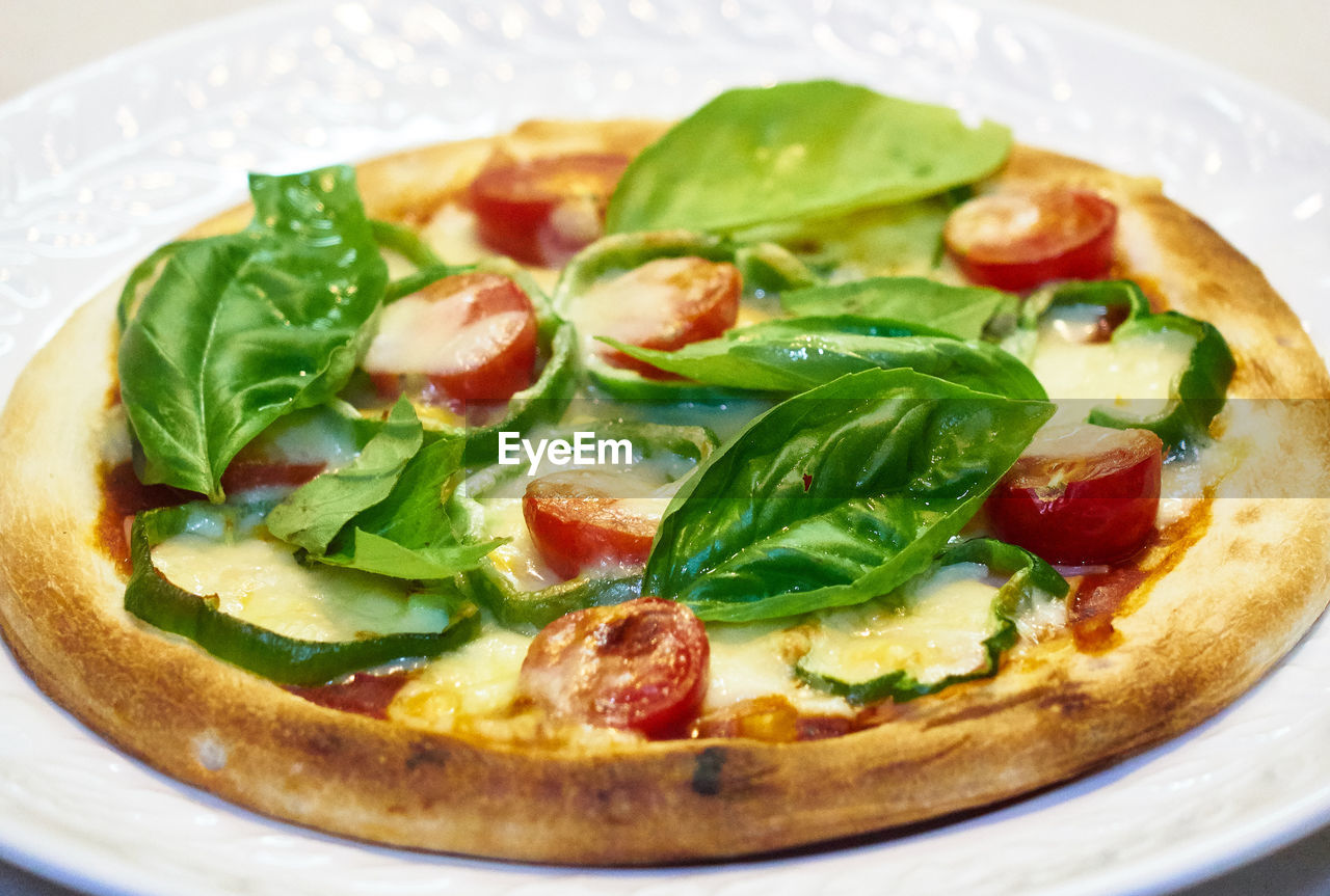 Close-up of homemade pizza served in plate