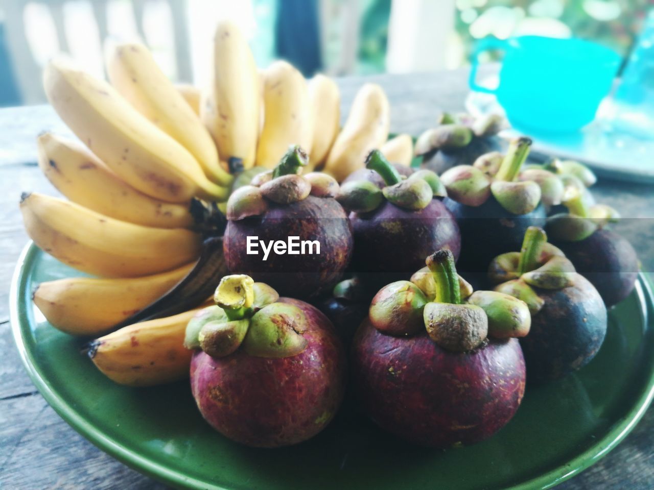 CLOSE-UP OF FRUITS ON TABLE