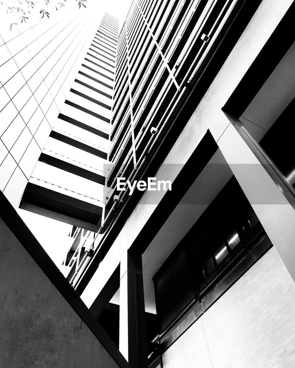 Low angle view of modern buildings against sky in city