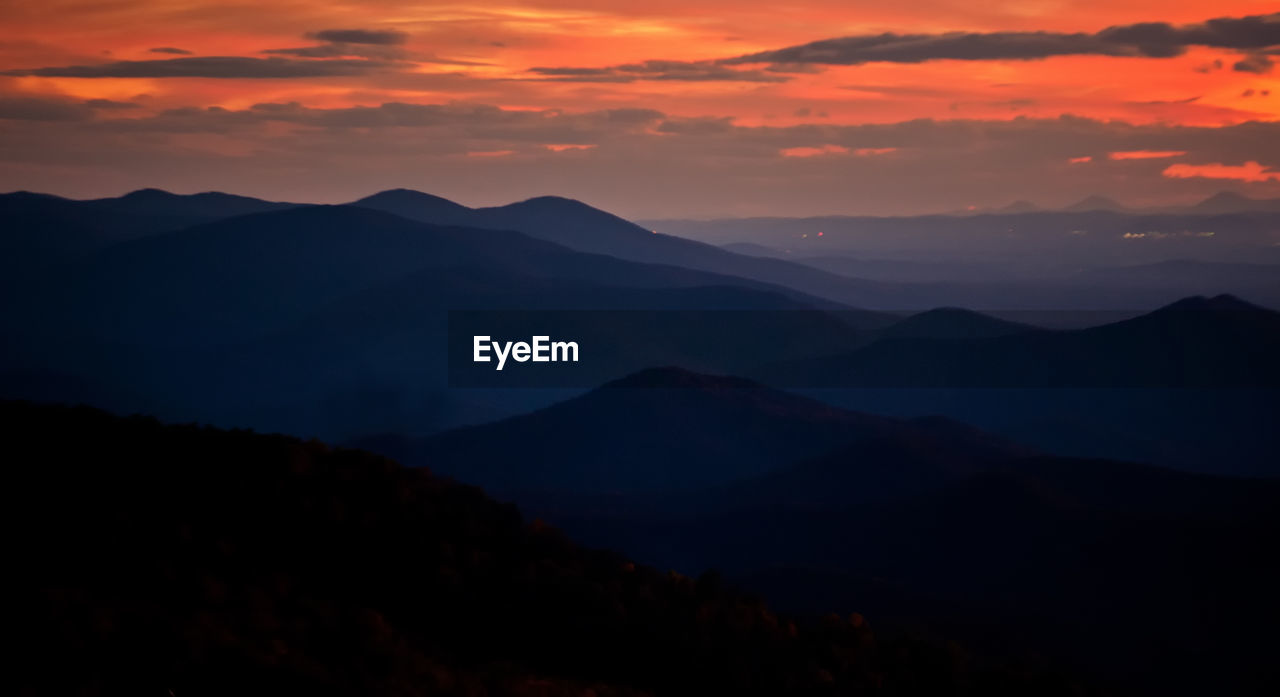 SUNSET OVER MOUNTAINS