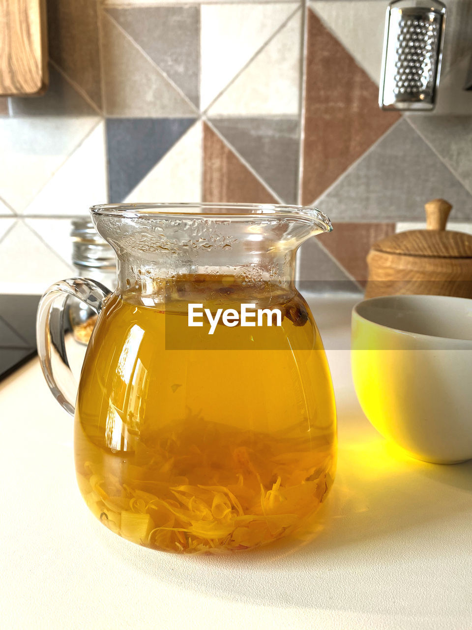 Close-up of glass jar on table