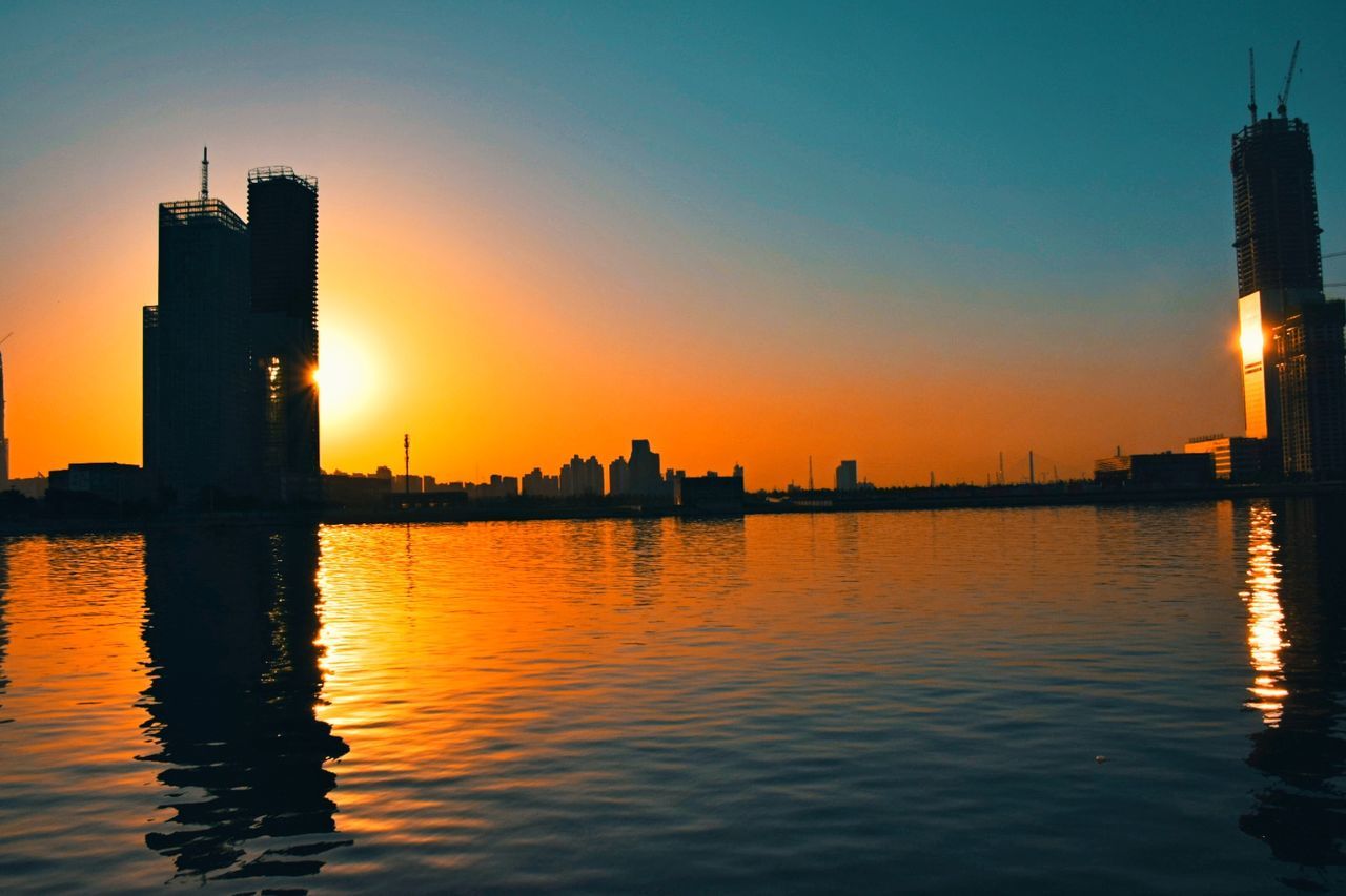 Silhouette of buildings at sunset