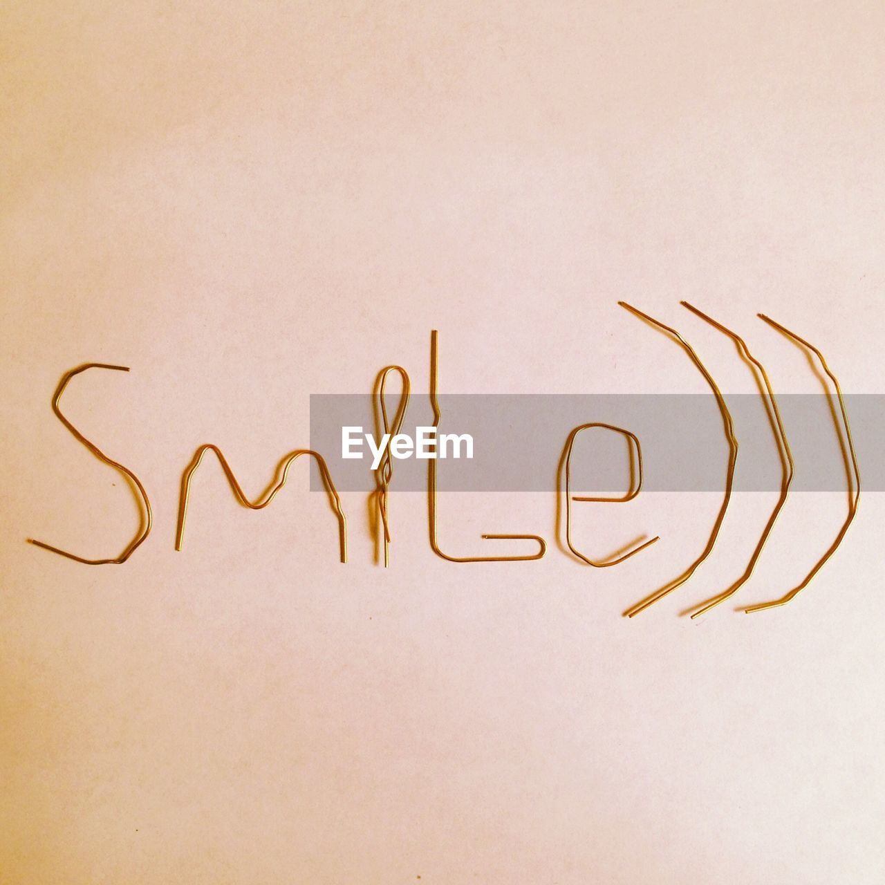 Close-up of smile text on wall