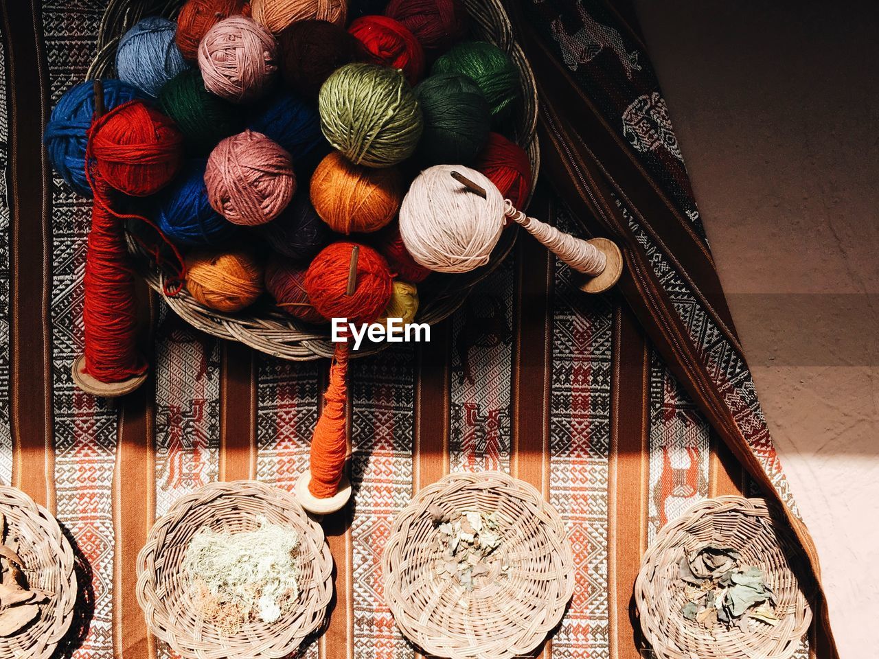 High angle view of wools in basket on table