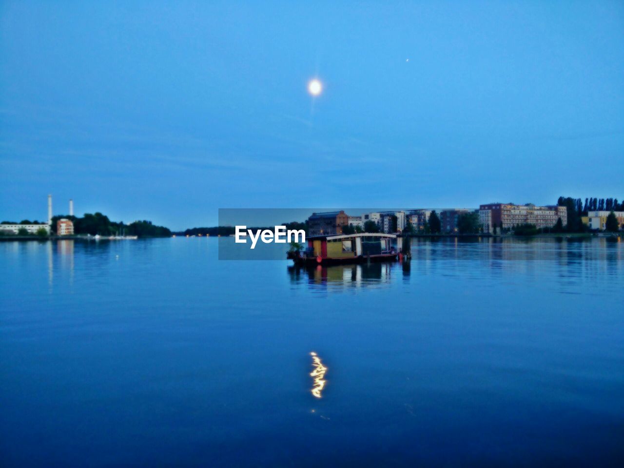 REFLECTION OF BUILT STRUCTURES IN WATER