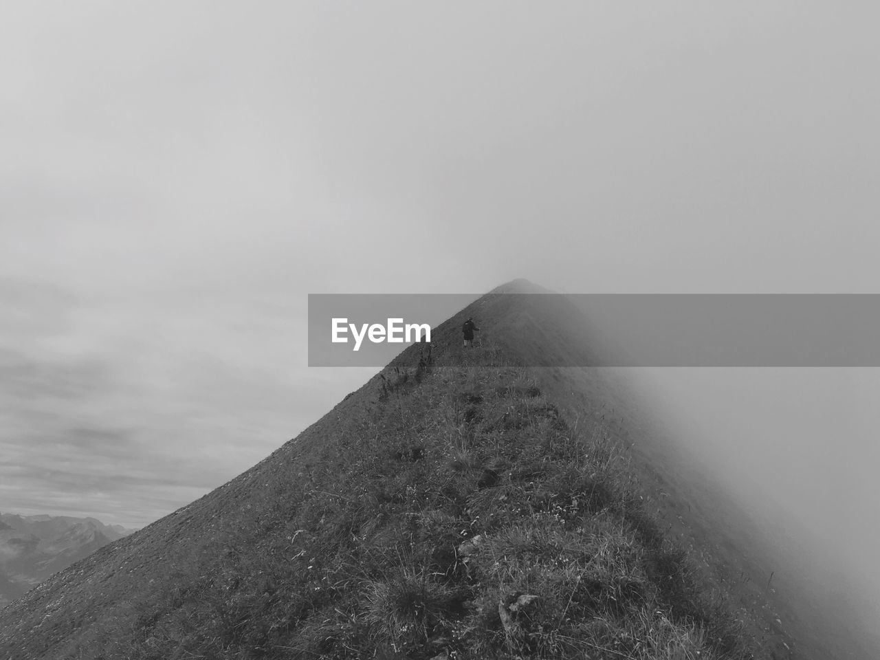 LOW ANGLE VIEW OF A MOUNTAIN AGAINST SKY