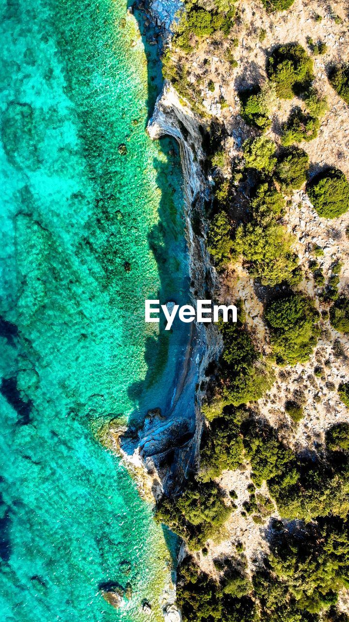 High angle view of rocks in sea