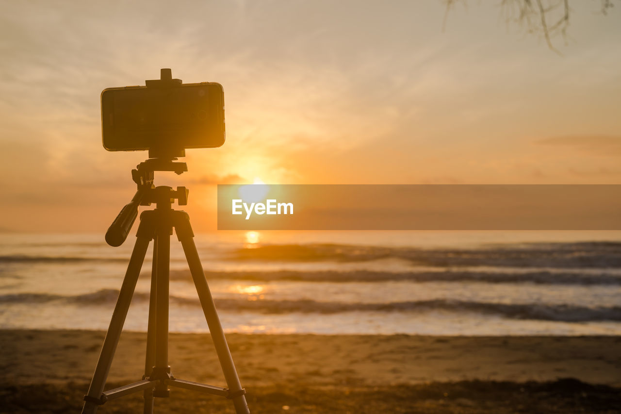 SCENIC VIEW OF SEA DURING SUNSET