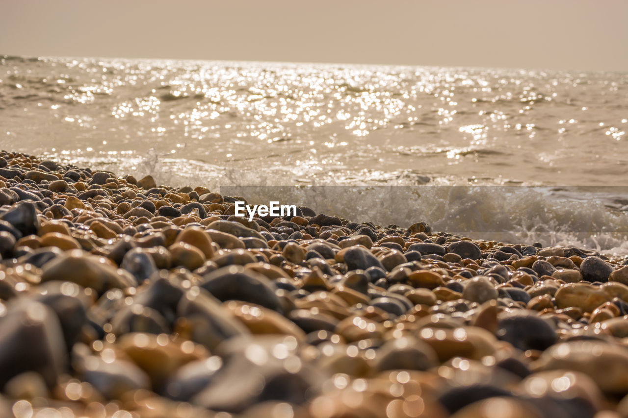 Close-up of pebbles on beach