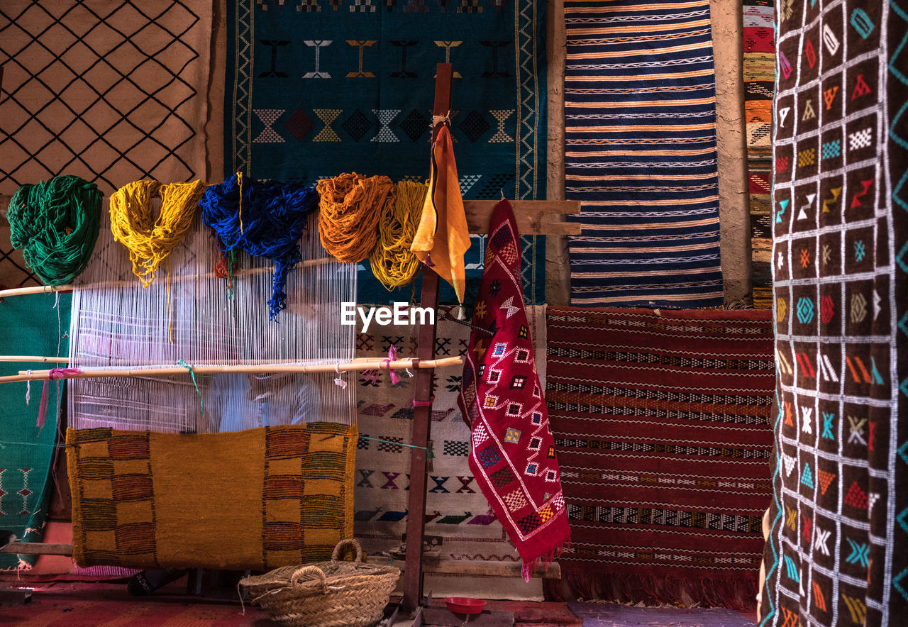 Clothes hanging on rack for sale at market