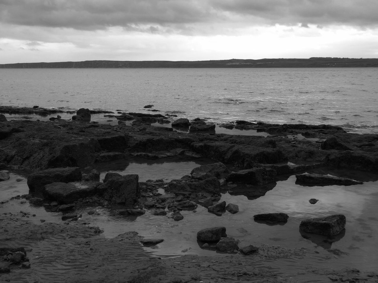 VIEW OF BEACH AGAINST SKY