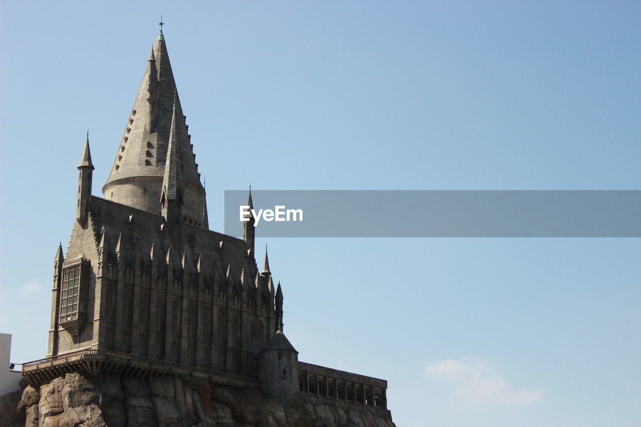 Low angle view of harry potter castle against sky