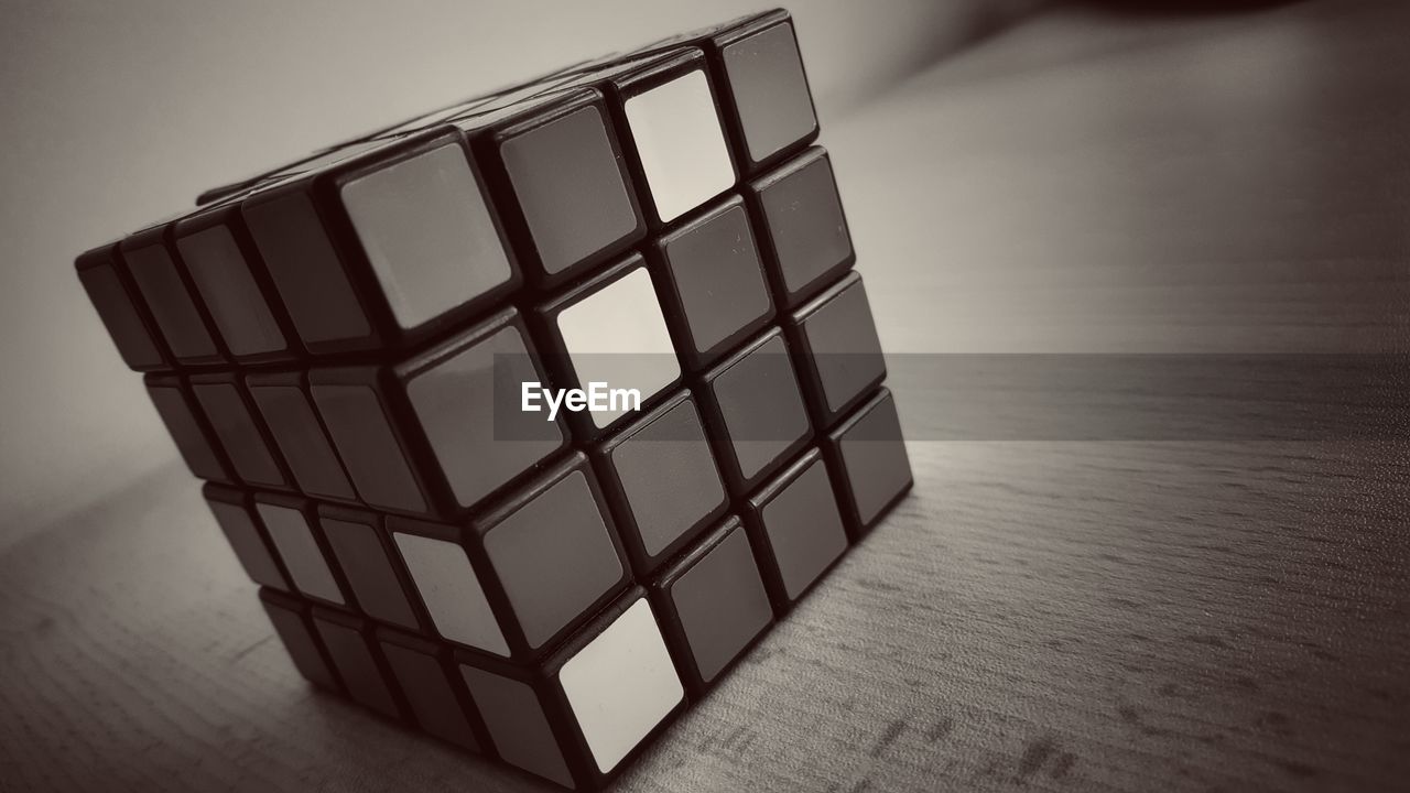 Close-up of puzzle cube on table