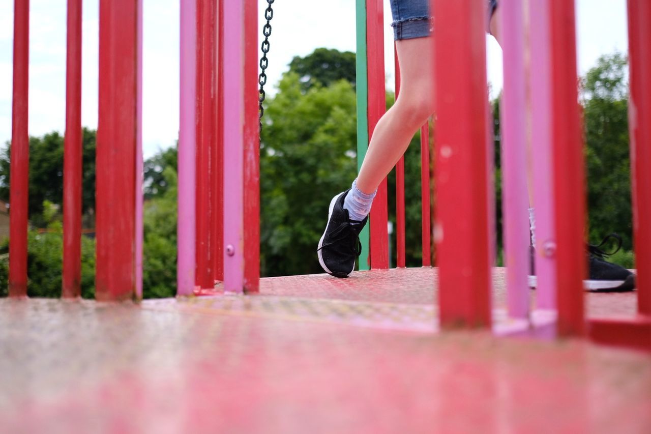 Low section of girl in playground