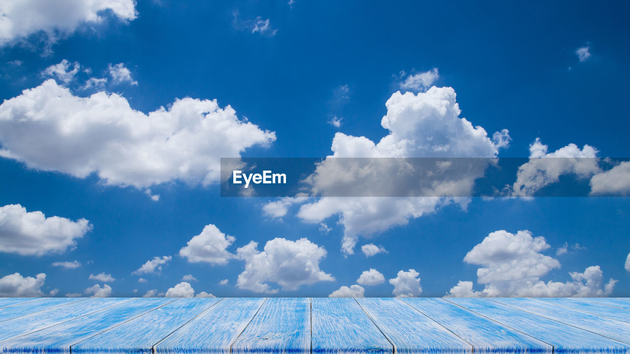 Low angle view of clouds against blue sky