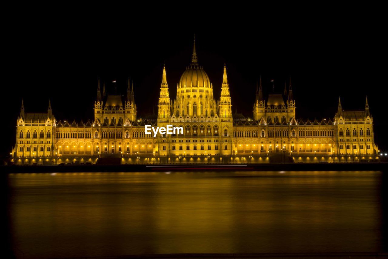 Illuminated parliament building at night