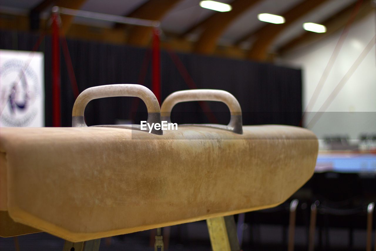 CLOSE-UP OF EMPTY CHAIRS AND TABLES IN KITCHEN